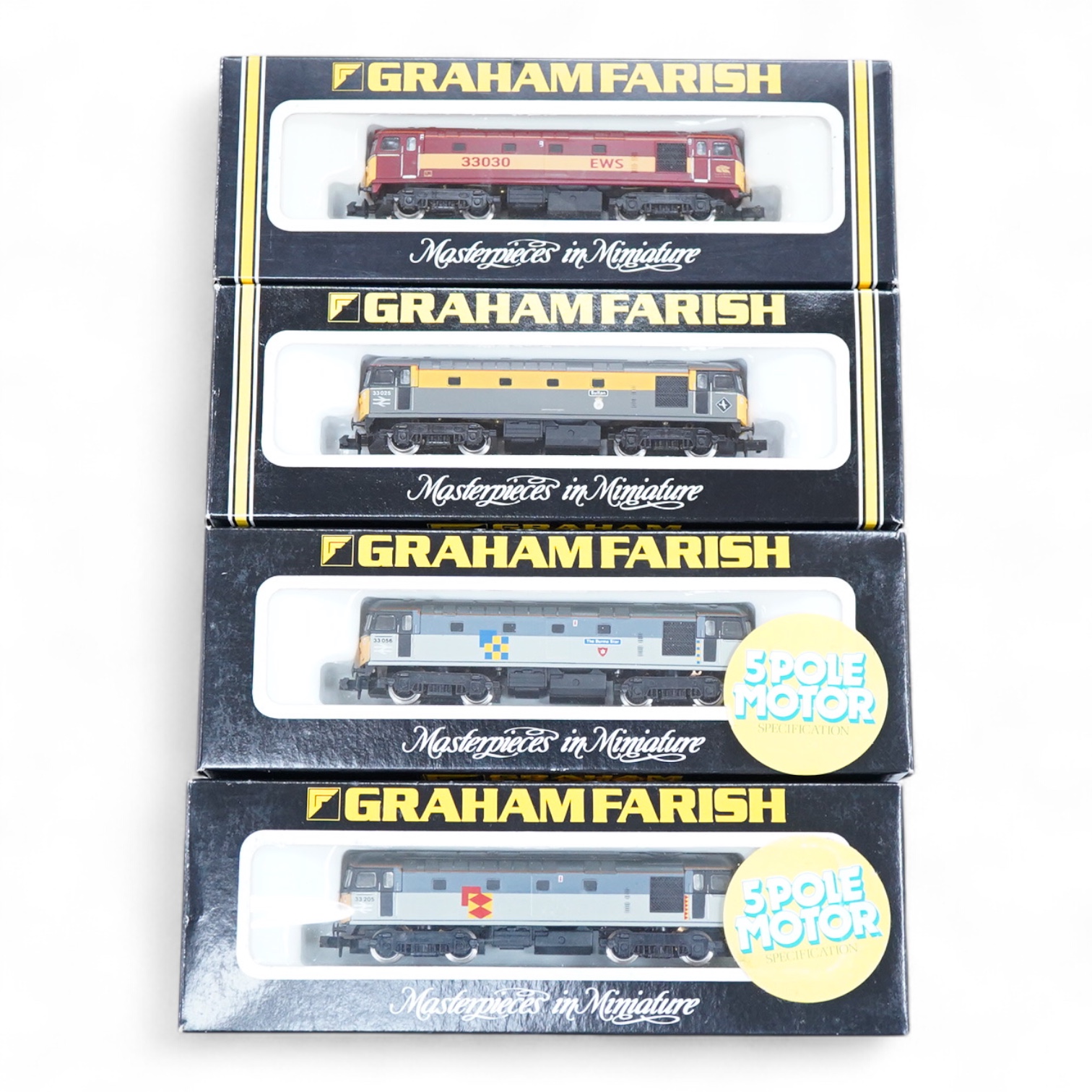 Four boxed Graham Farish N gauge railway Class 33 Bo-Bo diesel-electric locomotives; a BR, 33 205 (8317), a BR, 33 056 (8316), a BR, Sultan 33 025 (8312) and an EWS, 33030 (831A).